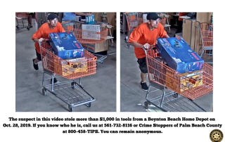 Man pushing shopping cart filled with hammer and drill sets