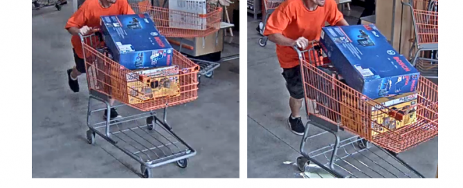 Man pushing shopping cart filled with hammer and drill sets