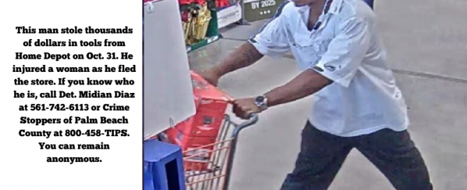 Black man in white shirt pushing shopping cart at Home Depot